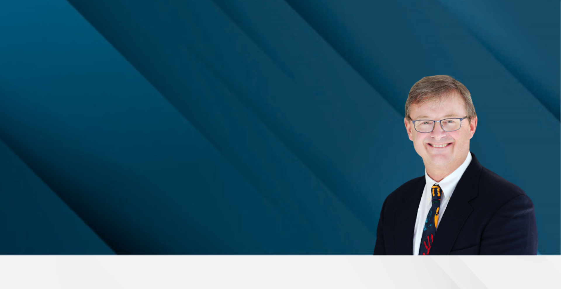 Dr. Sean Griggs on Blue Background