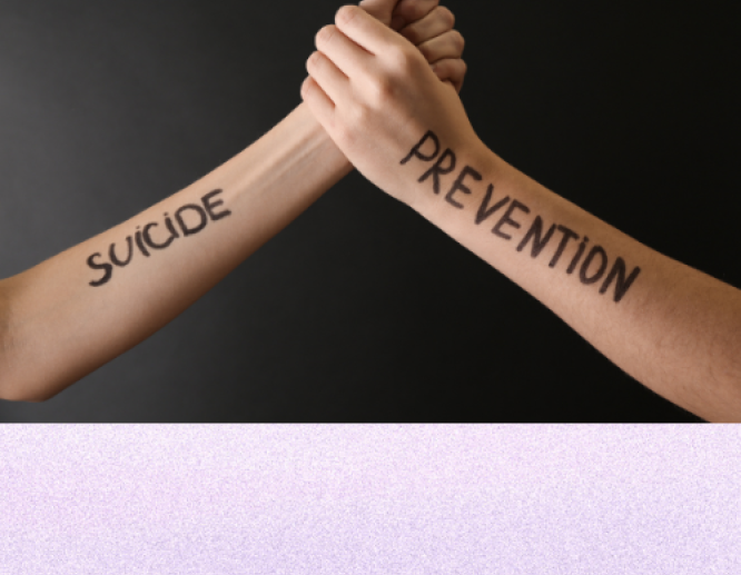 Hands Linked with Suicide Prevention Words on Arms